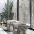 fotel Hessentia Cannes 302 zaprojektowana przez Claudio Cappellini, materiały: Tkanina, skóra